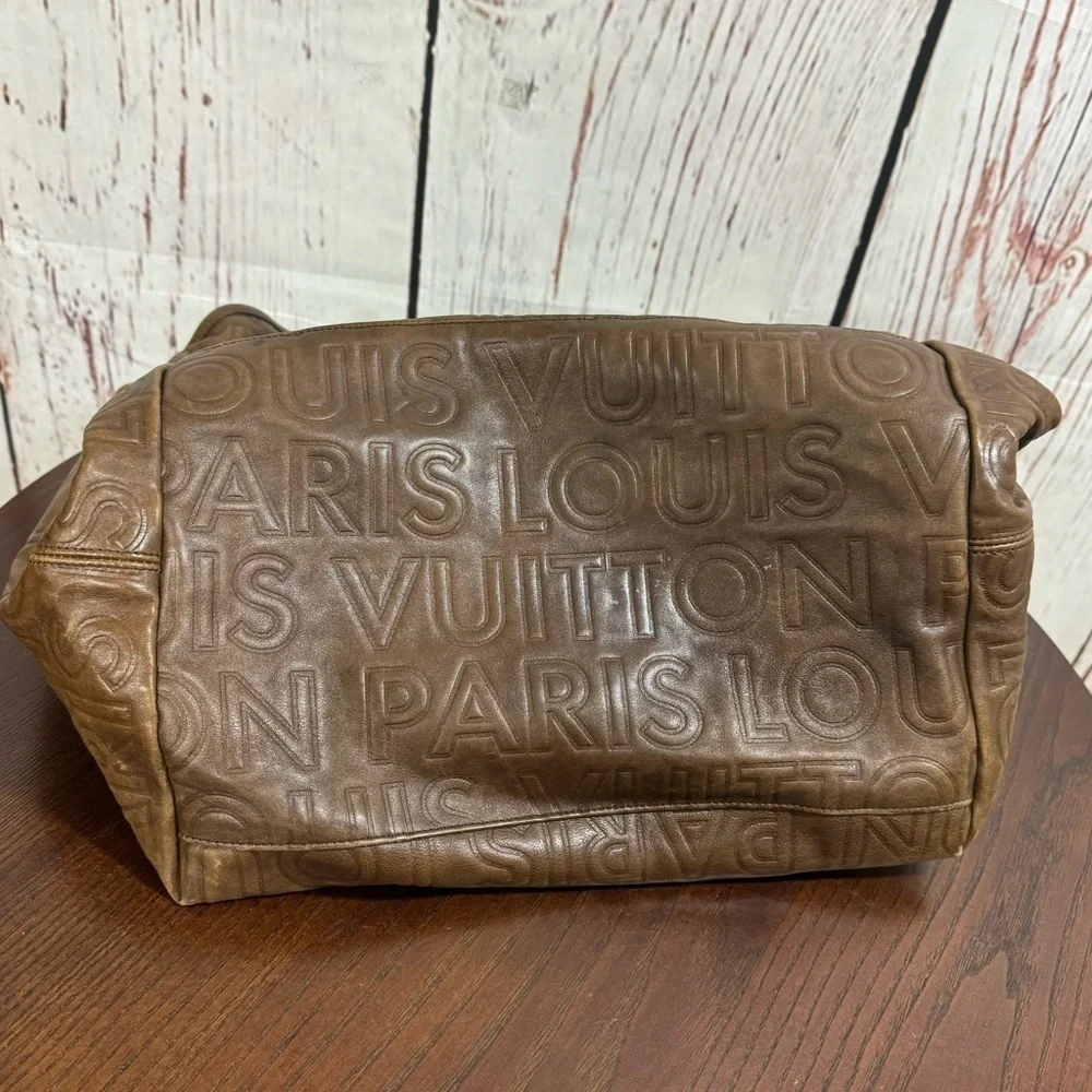 Louis Vuitton Paris Souple Whisper PM Chocolate Embossed leather bag limited